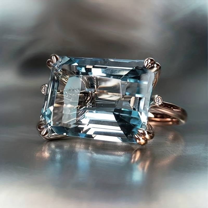 Retro sølvøreringe med blåt zirkonia i ringdesign
